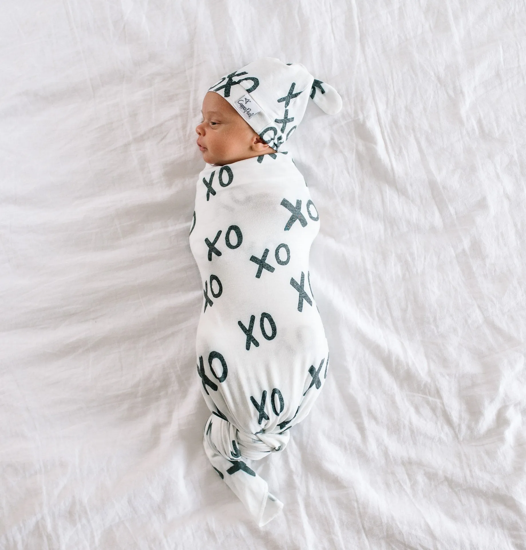Copper Pearl XOXO Top Knot Hat