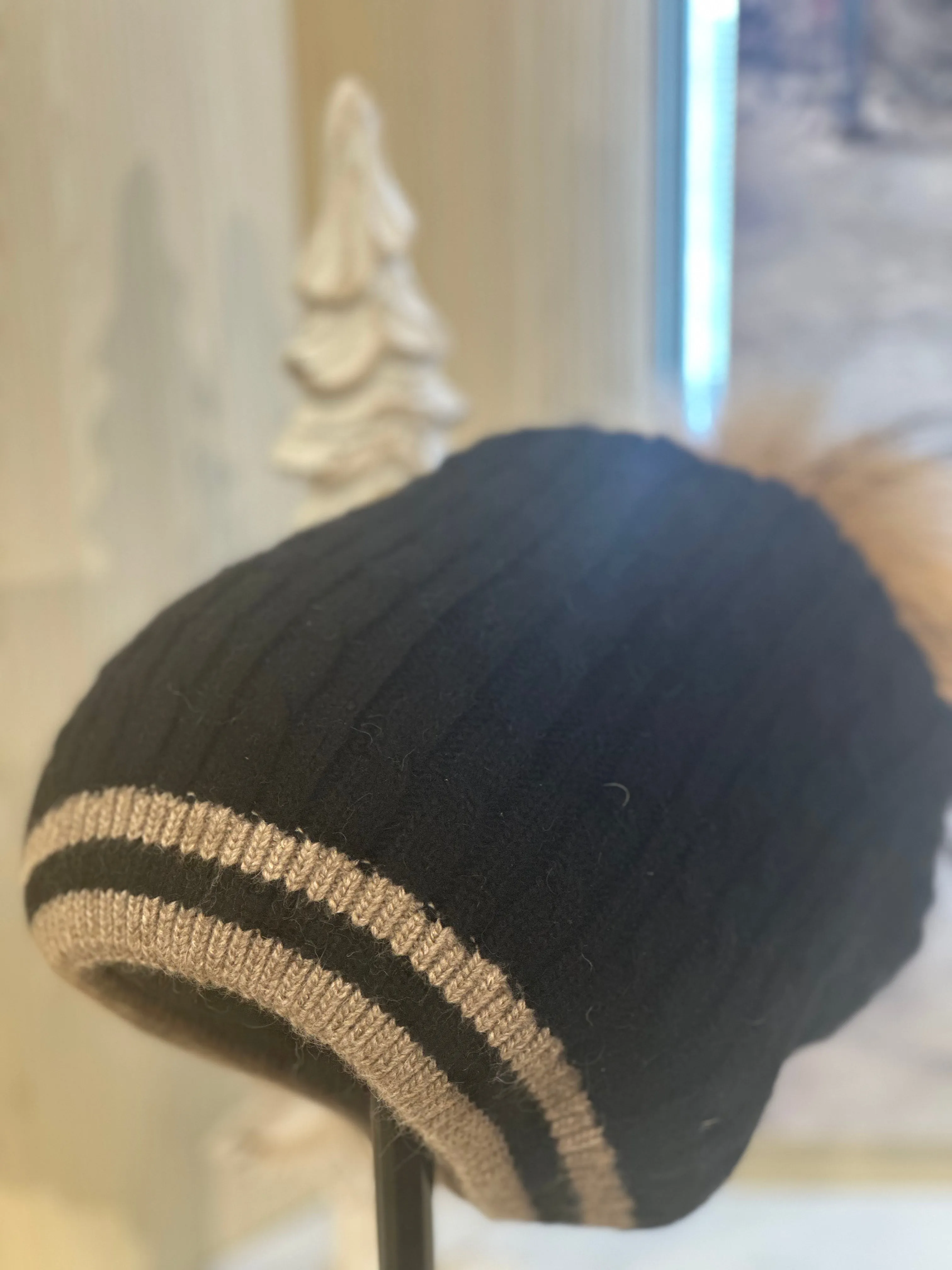 Espresso Cable Beanie Hat black cable hat with espresso raccoon pom