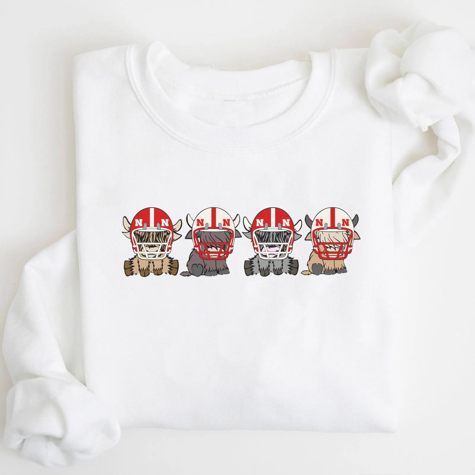 Nebraska Cornhuskers Football Highland Cow Football Team Football Lovers Gift Unisex Crewneck Hoodie Sweatshirt