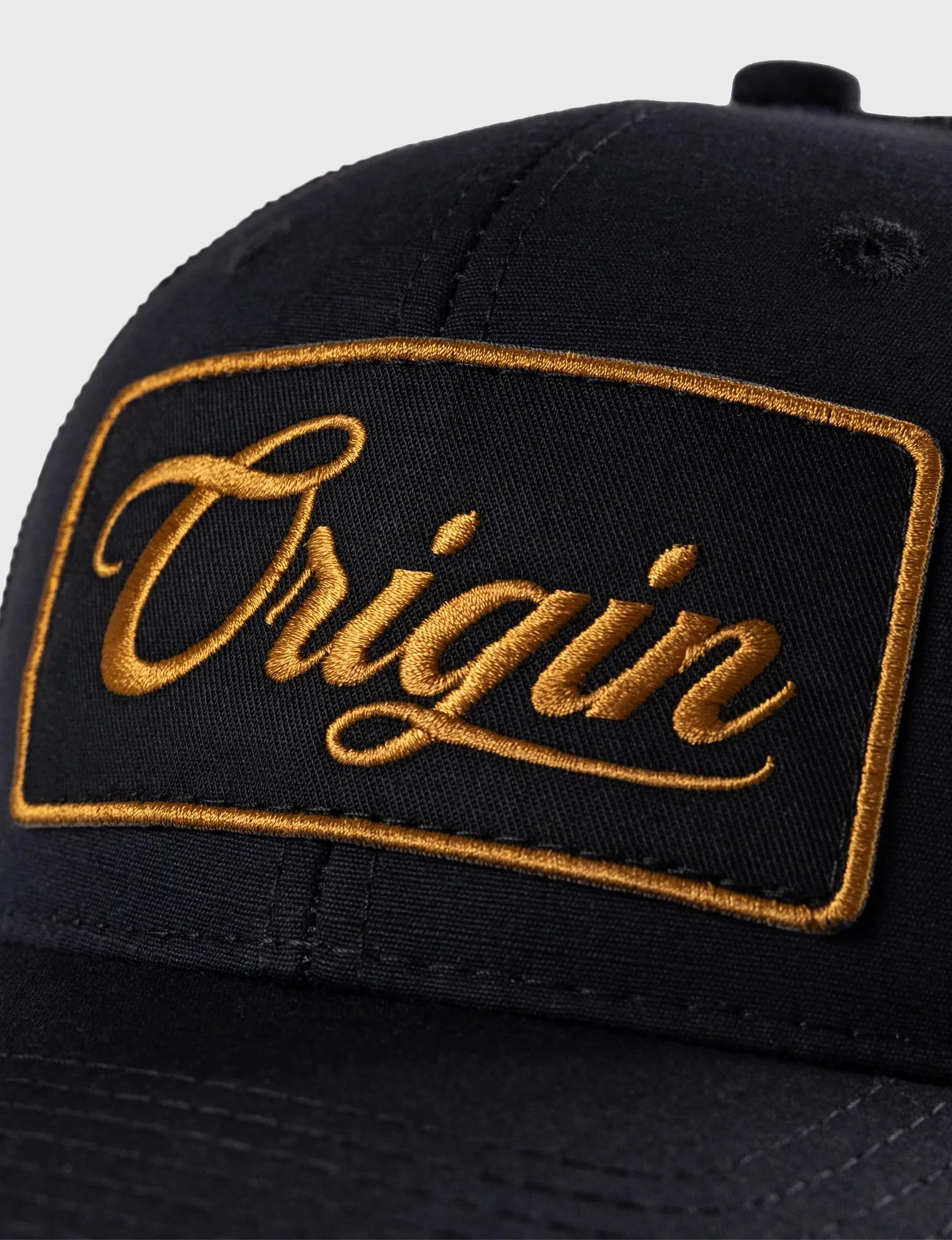 ORIGIN ATHLETIC SCRIPT TRUCKER HAT