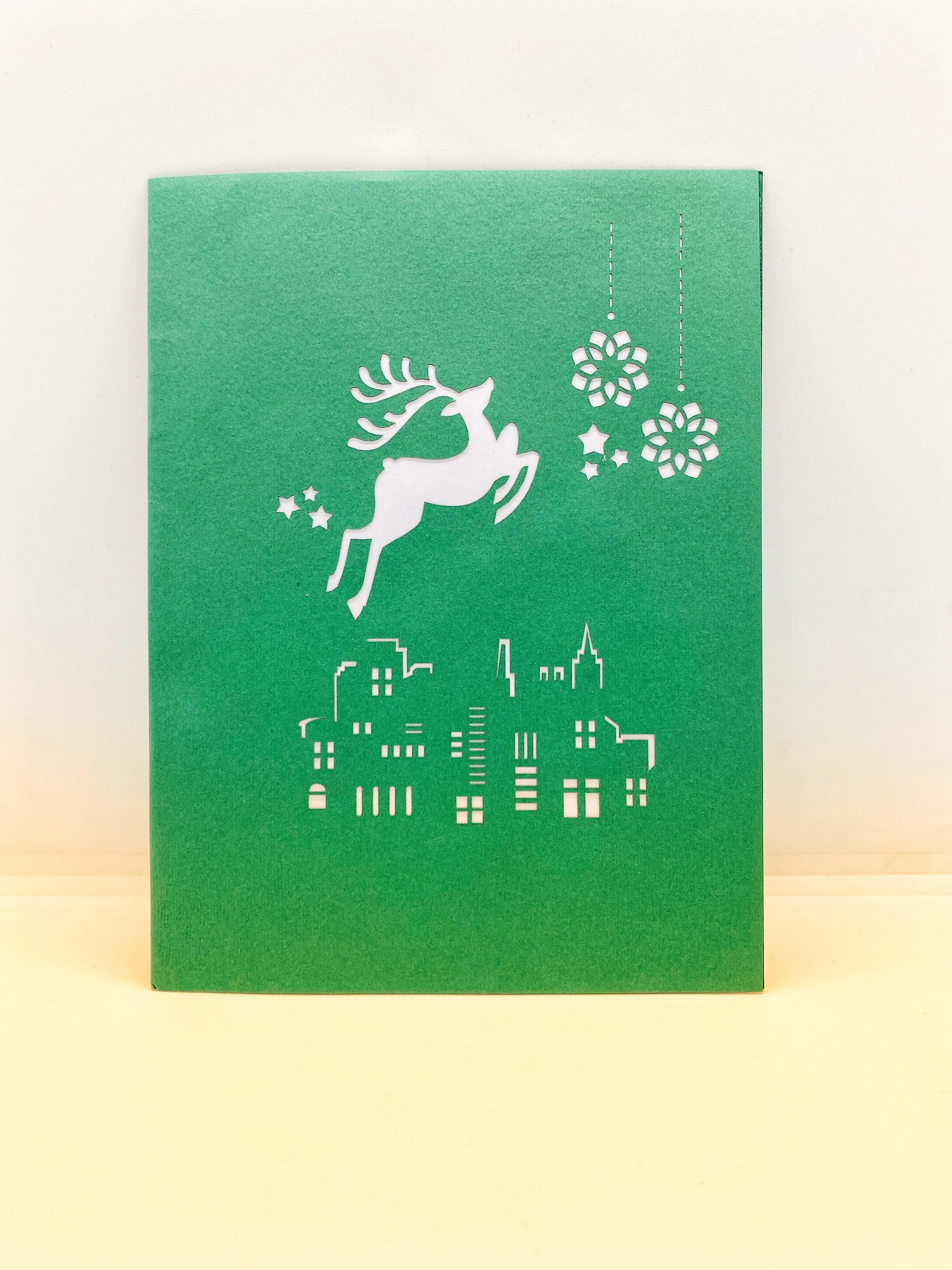 Pop-up Card _ Santa and His Reindeers Flying Over City
