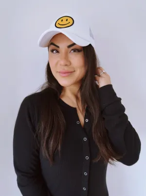 SMILEY FACE TRUCKER HAT IN WHITE